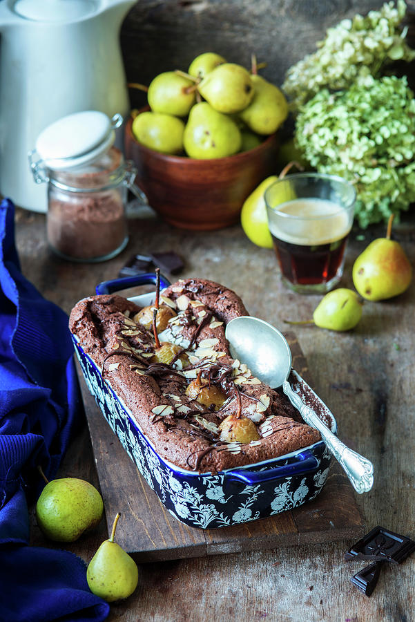 Chocolate Cake With Pears And Almonds In A Tray Photograph by Irina Meliukh