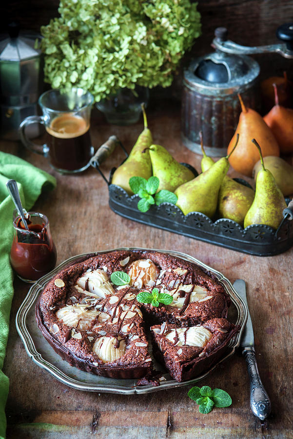 Chocolate Cake With Pears And Frangipane Photograph by Irina Meliukh