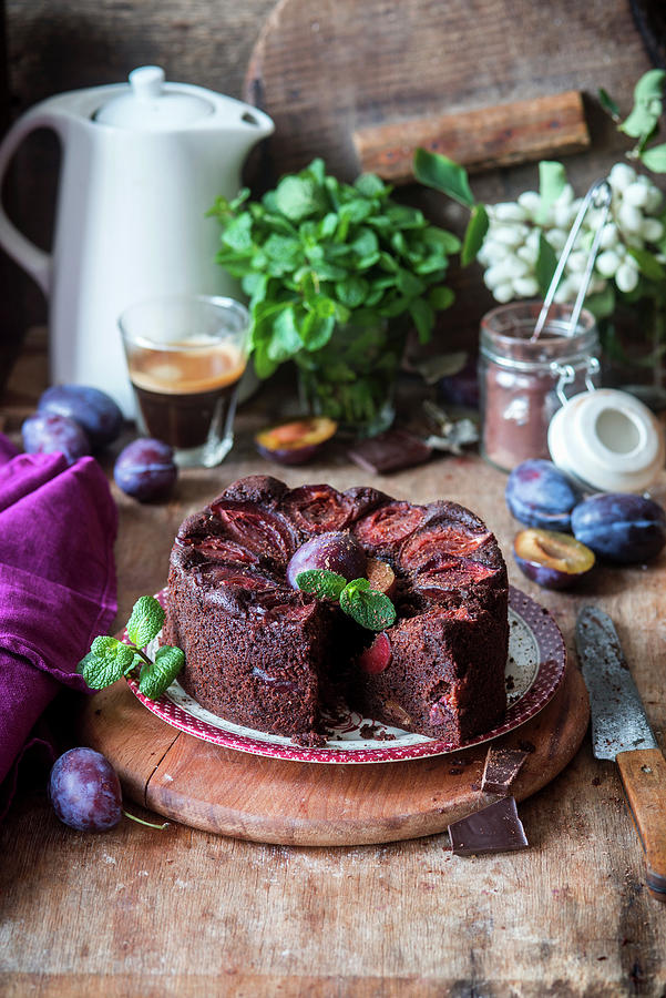 Chocolate Cake With Plums, Sliced Photograph by Irina Meliukh
