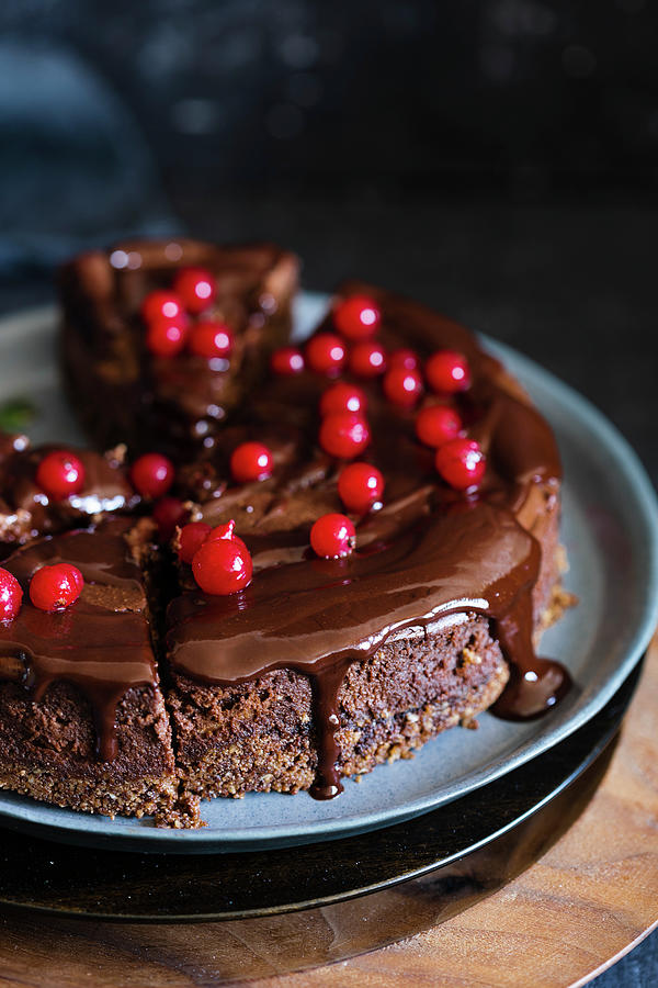Chocolate Cheesecake With Red Currants Photograph by Lilia Jankowska
