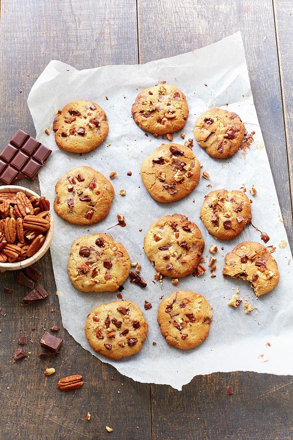 Chocolate Chip And Pecan Cookies Photograph by Radvaner