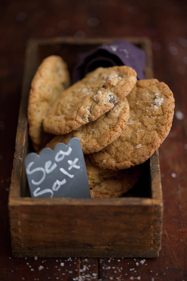 Chocolate Chip Cookies With Sea Salt In A Wooden Box Photograph by Eising Studio