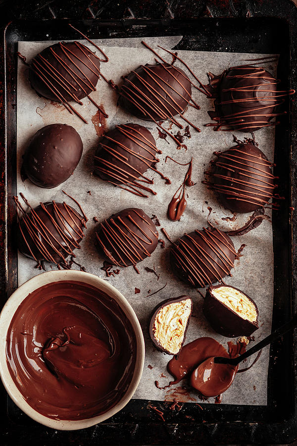 Chocolate-coated Caramel Marshmallow Easter Eggs Photograph by Great Stock!