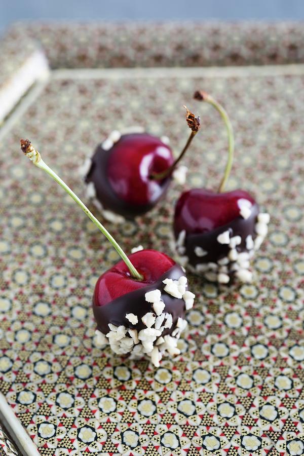Chocolate-coated Cherries With Chopped Almonds Photograph by Mandy Reschke