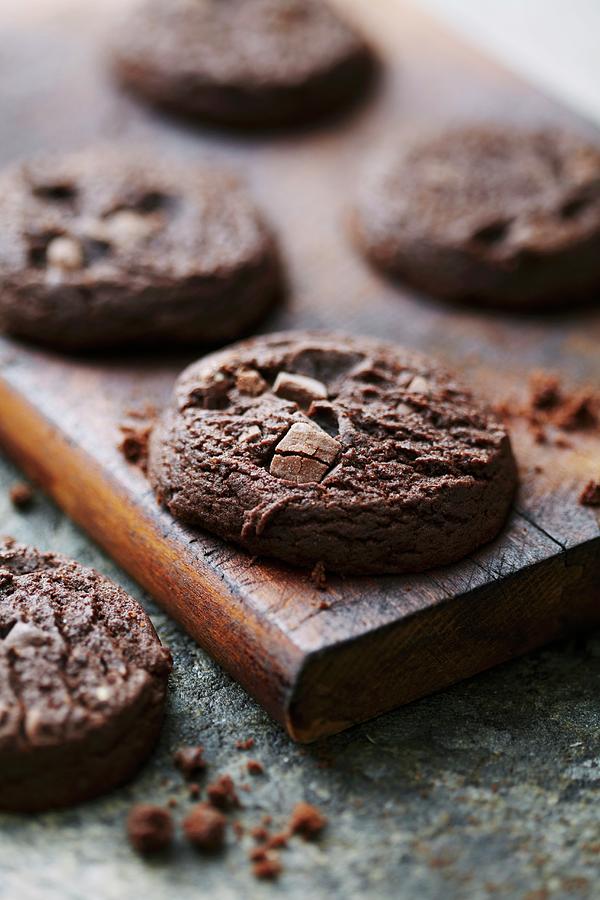 Chocolate Cookies On A Wooden Board Photograph by Friis, Liv