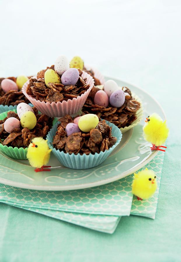 Chocolate Cornflake Nests With Ornamental Chicks Photograph by Firmston, Victoria