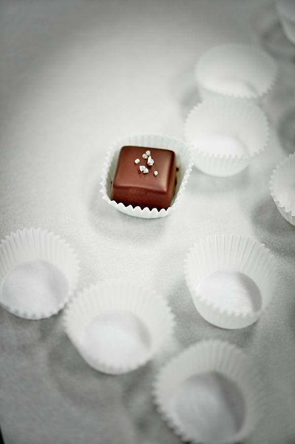 Chocolate-covered Caramel Sweet With Sea Salt Photograph by Greg Rannells