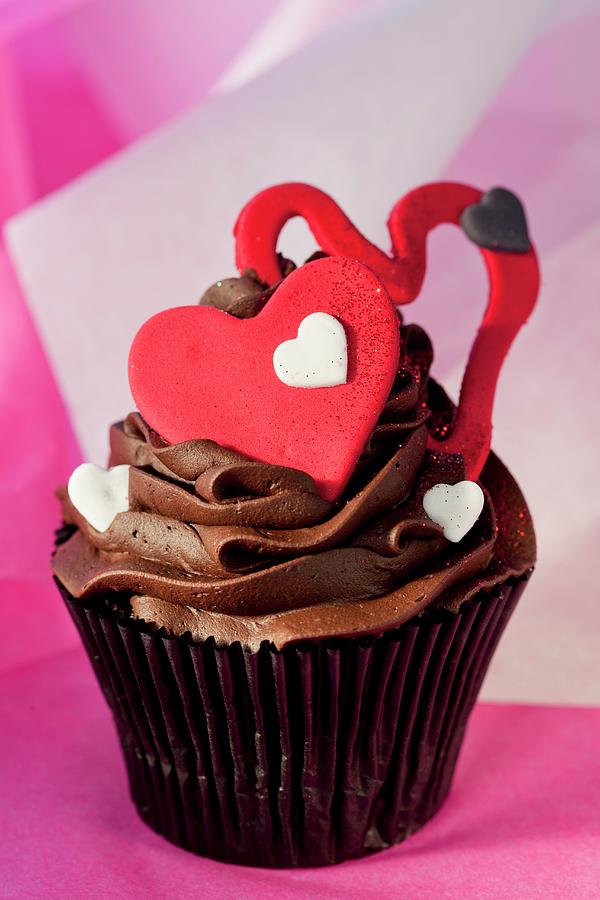 Chocolate Cupcake With Ganache, Buttermilk Filling And Red Hearts Photograph by Creative Photo Services