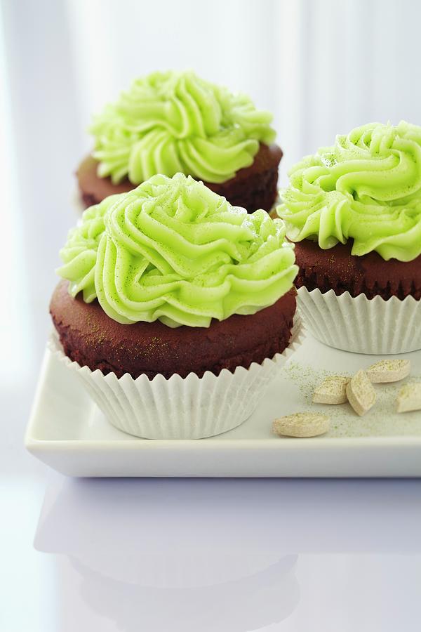 Chocolate Cupcakes With A Matcha Topping Photograph by Franziska Taube