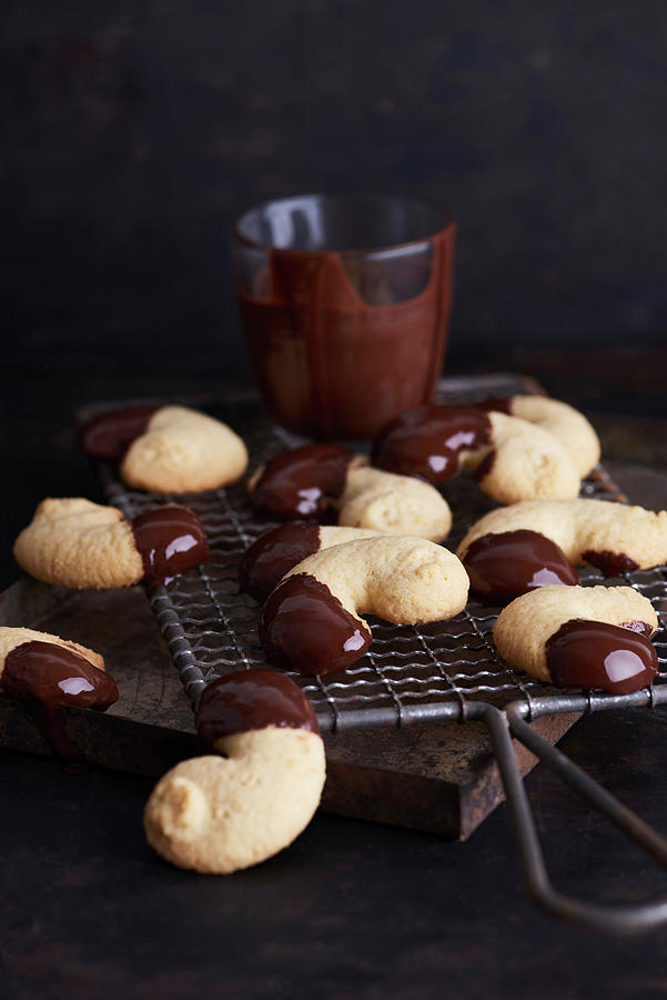 Chocolate-dipped Almond Biscuits On A Cooling Rack Photograph by Sylvia Meyborg