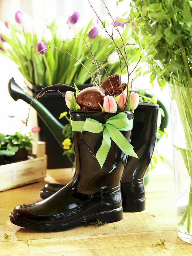 Chocolate Easter Bunny And Tulips In Black Wellington Boots Photograph by Biglife