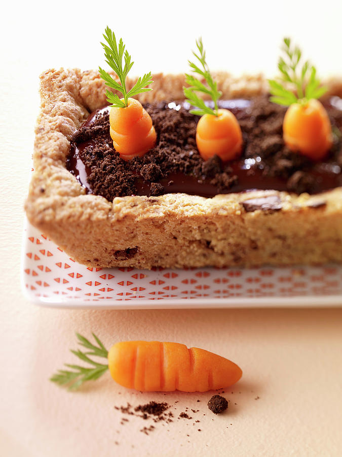 Chocolate Ganache, Oreo Biscuit Powder And Carrot Large Easter Cookie In An Almond Casing Photograph by Goumard