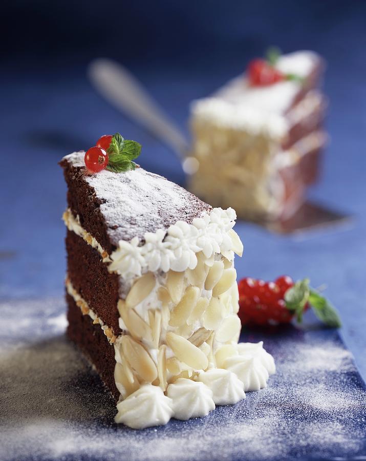 Chocolate Gateau With Almond Cream Photograph by Blueberrystudio