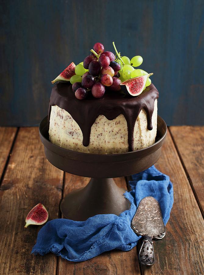 Chocolate Layer Cake With Figs And Grapes Photograph by Ewgenija Schall