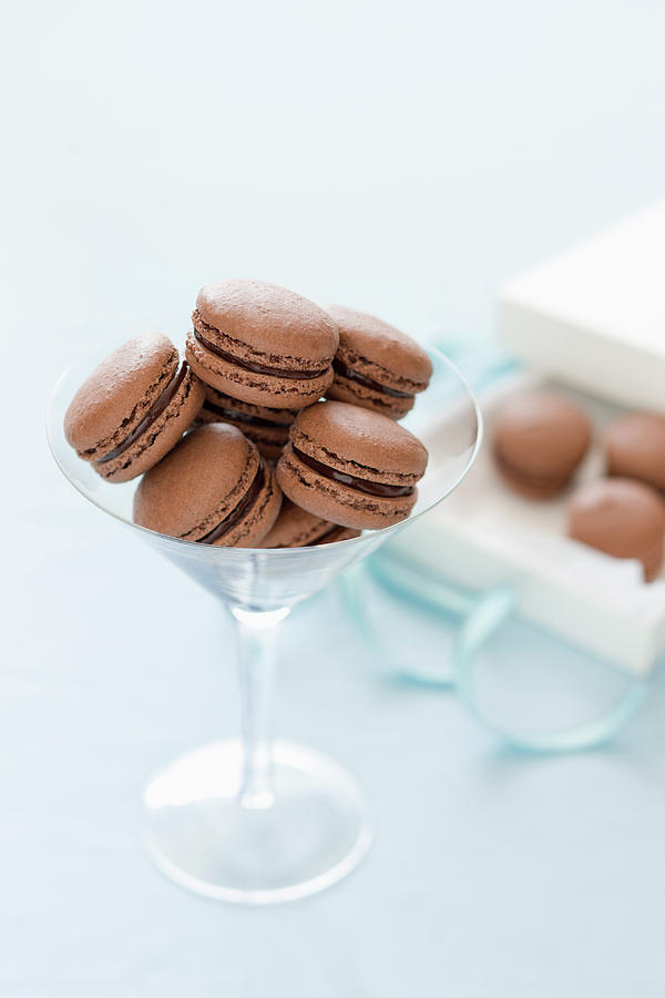 Chocolate Macarons In A Long-stemmed Glass Photograph by Andrew Young