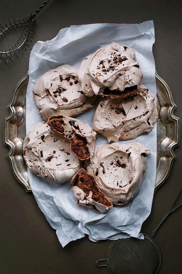 Chocolate Meringues On A Metal Plate With Baking Paper Photograph by Magdalena Hendey