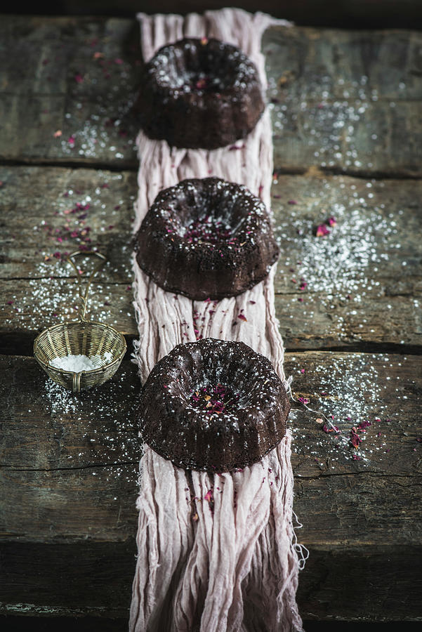 Chocolate Mini Bundt Cakes With A Dusting Of Powder Photograph by Donna Crous