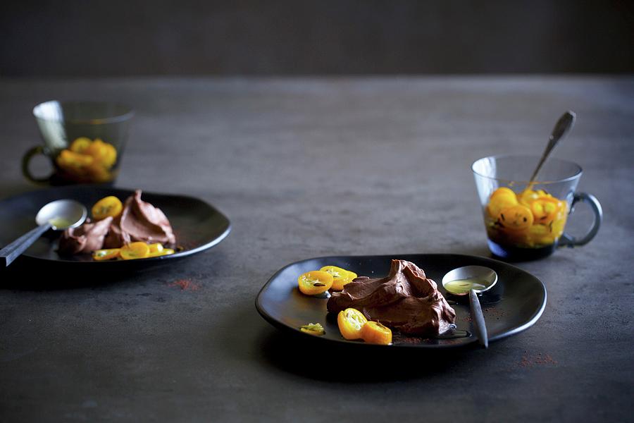 Chocolate Mousse With Kumquats Photograph by Fotos Mit Geschmack Jalag