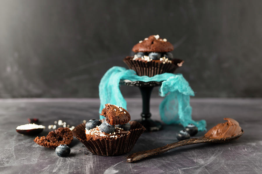 Chocolate Muffins Filled With Chocolate Cream And Blueberries Photograph by Mandy Reschke