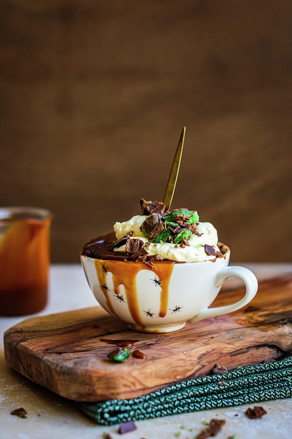Chocolate Mug Cake With Caramel, Cream And Peppermint Crisp Chocolate Photograph by Hein Van Tonder