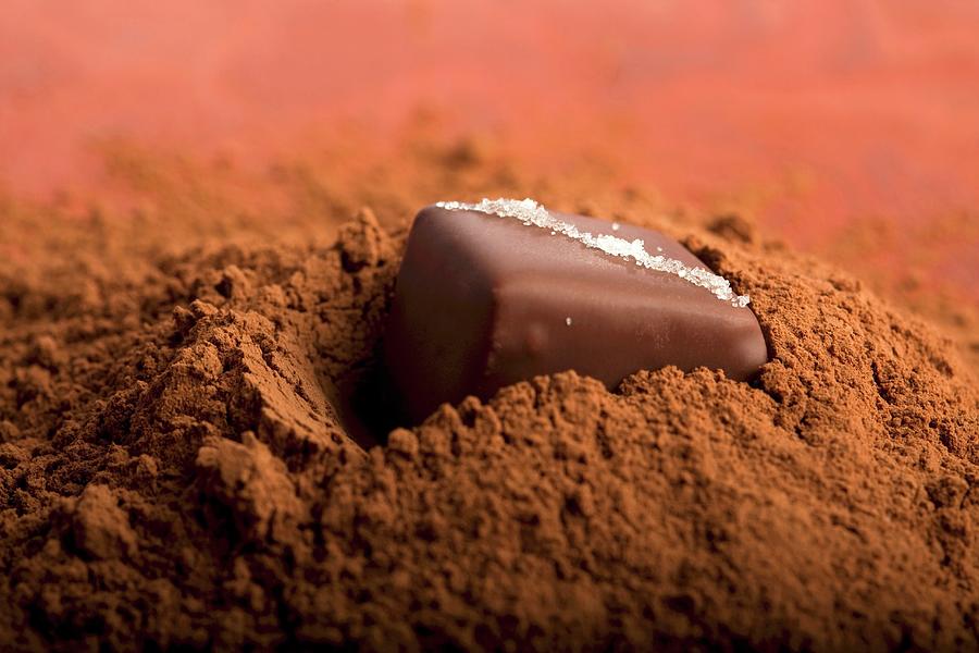 Chocolate On A Heap Od Cacao Photograph by Medina