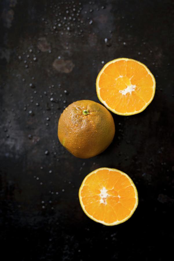 Chocolate Oranges: An Orange Variety With A Dark Skin Photograph by Manuela Rther