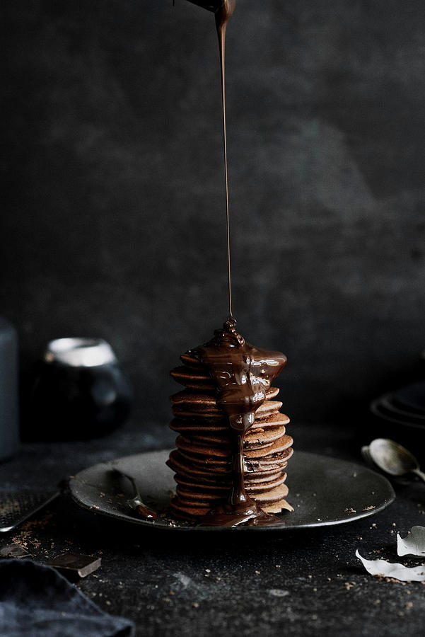 Chocolate Pancakes Topped With Melted Chocolate Photograph by Kasia Wala