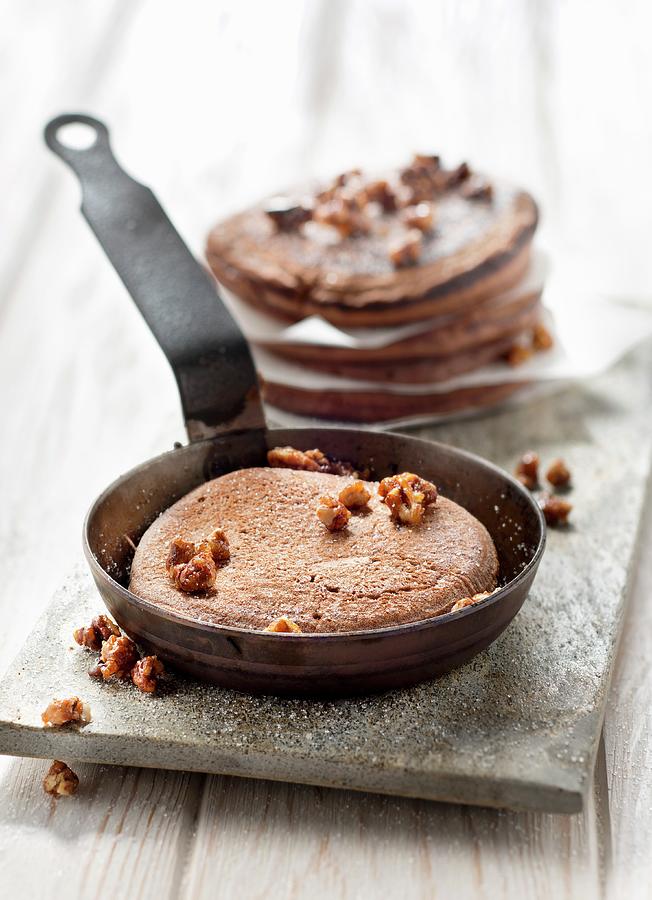 Chocolate Pancakes With Caramelized Crushed Pecans Photograph by Studio