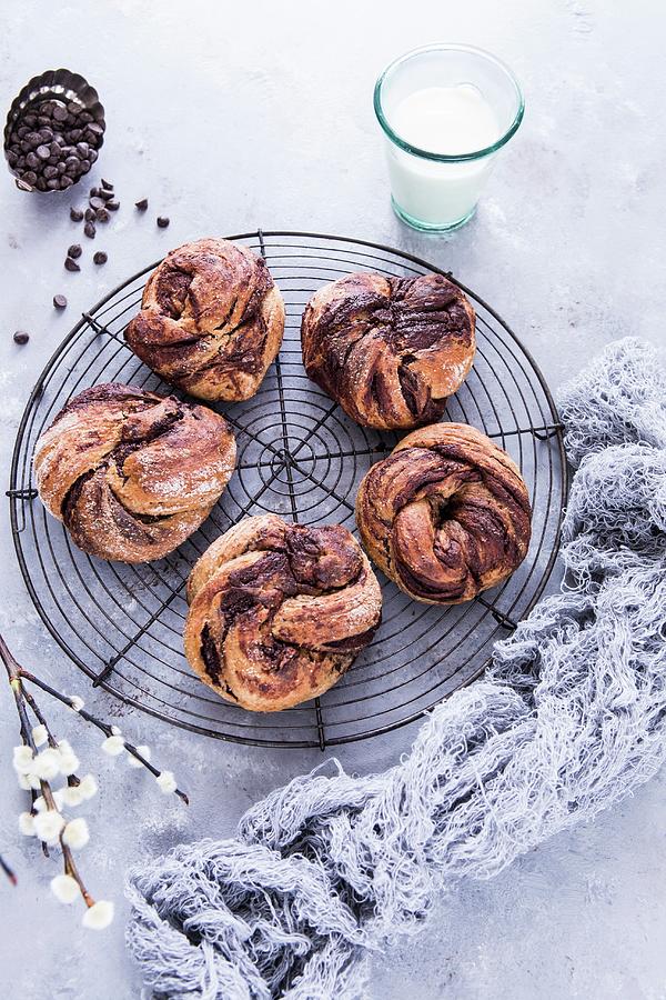 Chocolate Pastry Swirls On A Wire Rack Photograph by Aniko Takacs
