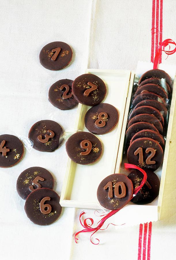 Chocolate Peppermints Decorated With Numbers As An Advent Calendar Photograph by Jalag / Julia Hoersch
