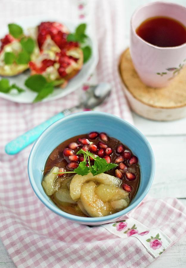 Chocolate Porridge With Pears And Pomegranate Seeds Photograph by Dorota Indycka