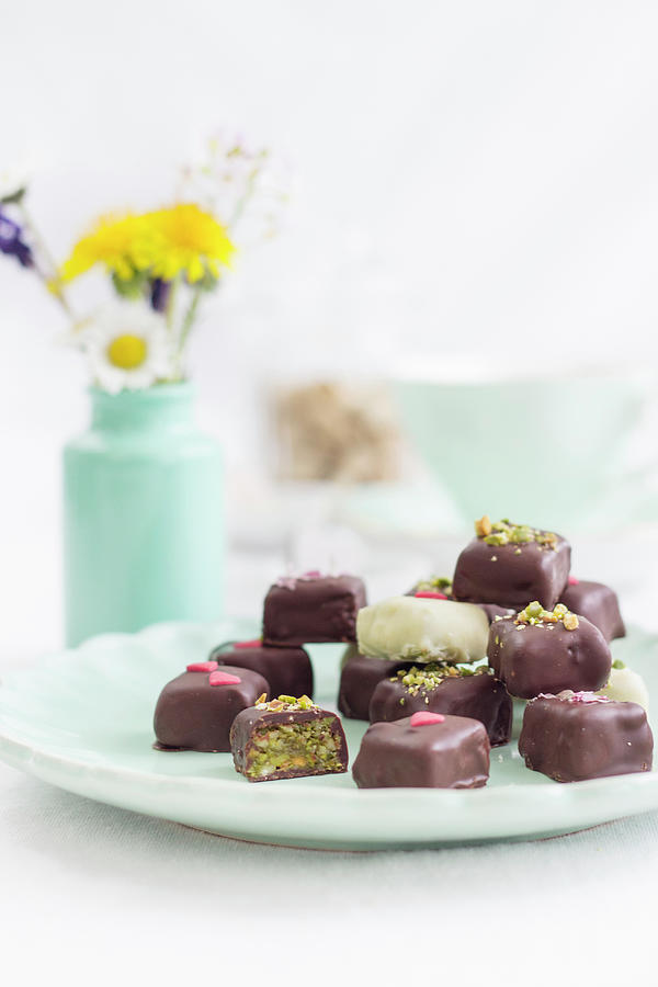 Chocolate Pralines With Pistachios And Marzipan Photograph by Tamara Staab