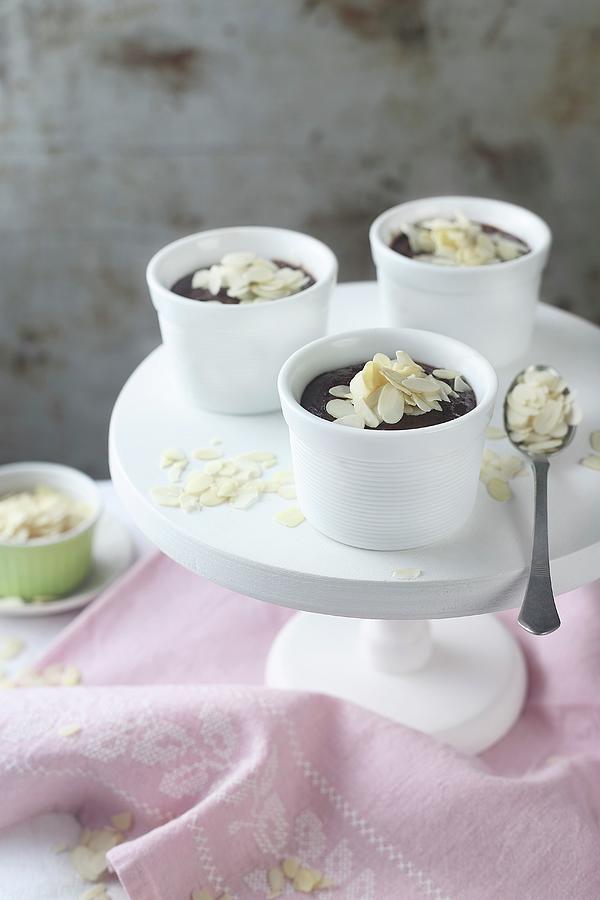 Chocolate Pudding With Almond Flakes Photograph by Zita Csig