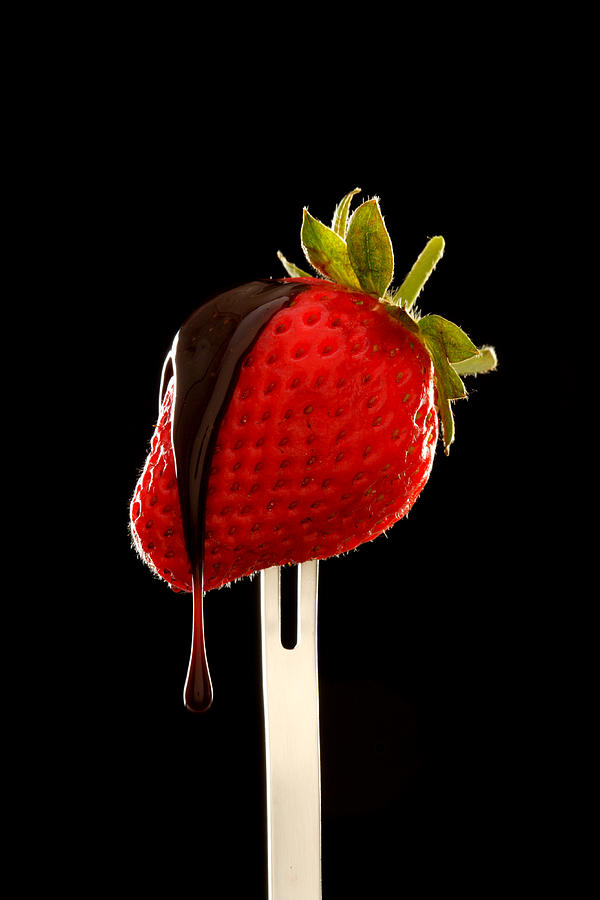 Chocolate Running Off Strawberry Photograph by Harrison Eastwood