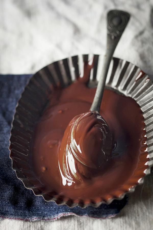 Chocolate Sauce In A Metal Bowl With A Spoon Photograph by Great Stock!