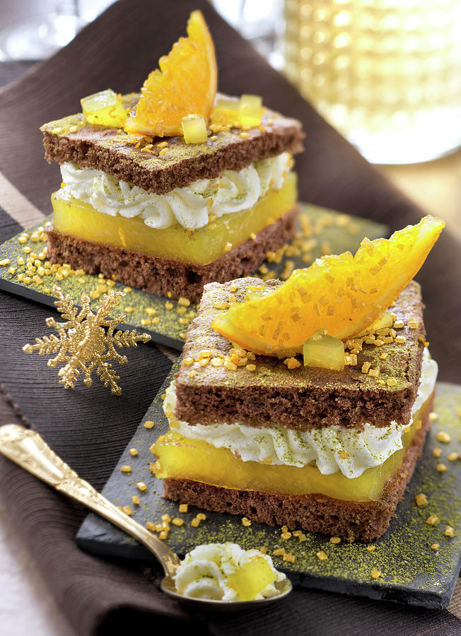 Chocolate Sponge Cake With Orange Curd, Whipped Cream And Green Tea Photograph by Studio