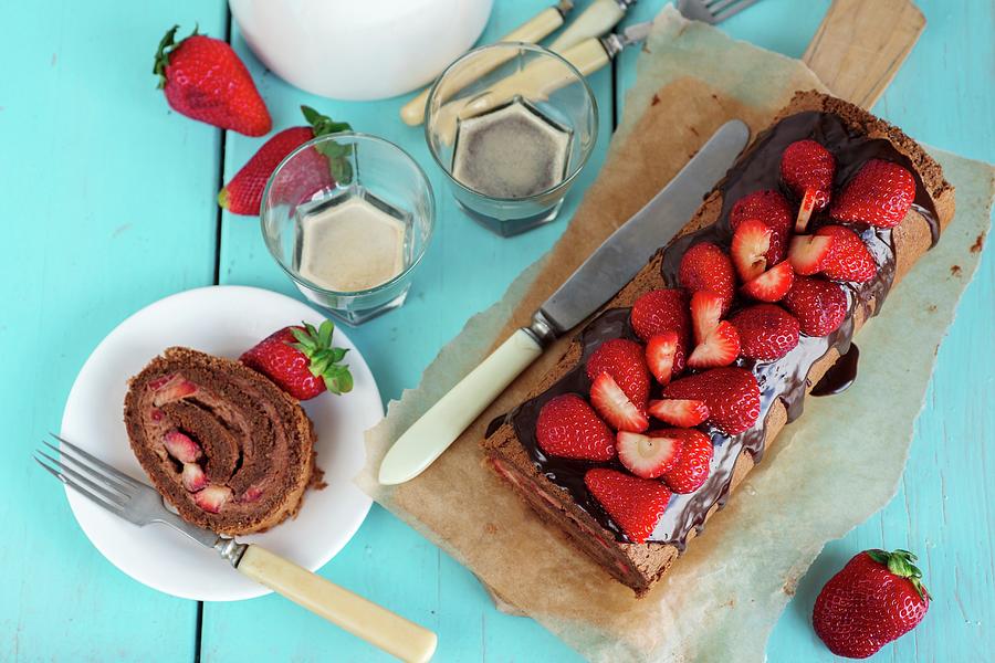 Chocolate Swiss Roll With Strawberries Photograph by Irina Meliukh