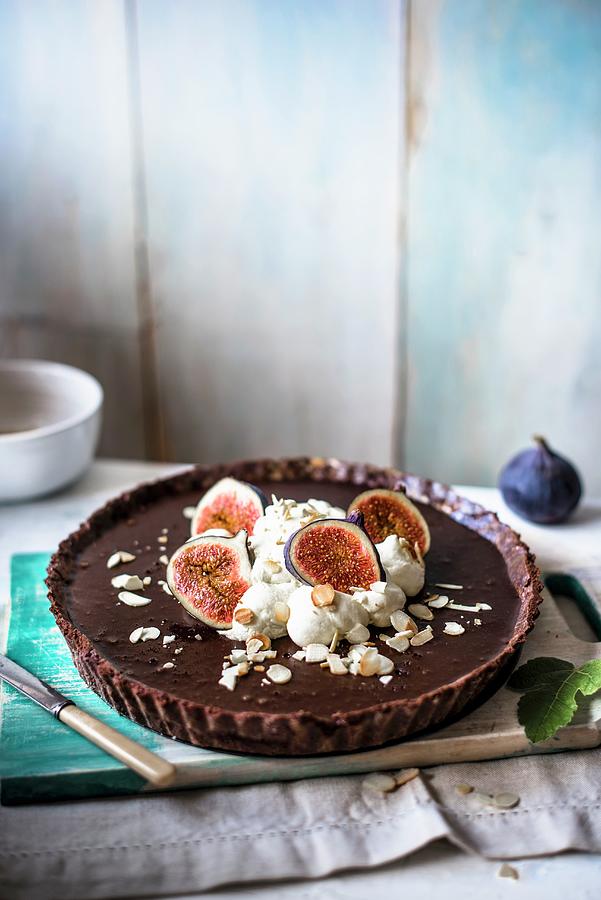 Chocolate Tart With Cream, Fresh Figs And Almonds Photograph by Magdalena Hendey