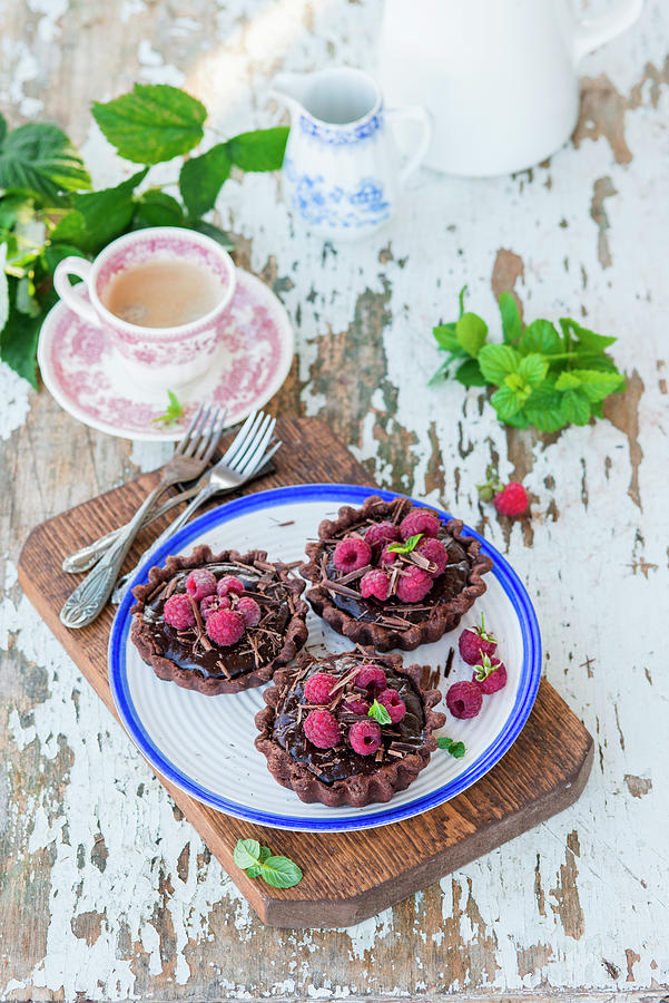Chocolate Tarts With Raspberries Photograph by Irina Meliukh