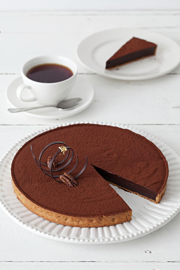 Chocolate Torte With An Elegant Tuile Served With A Coffee Photograph by Steven Joyce