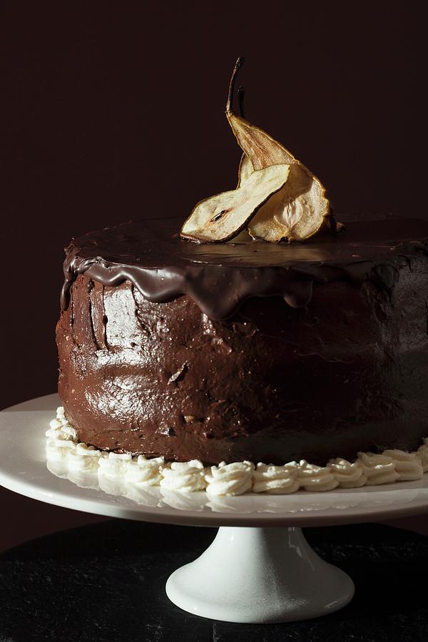 Chocolate Torte With Dried Pears Photograph by Anna Grudzinska-sarna