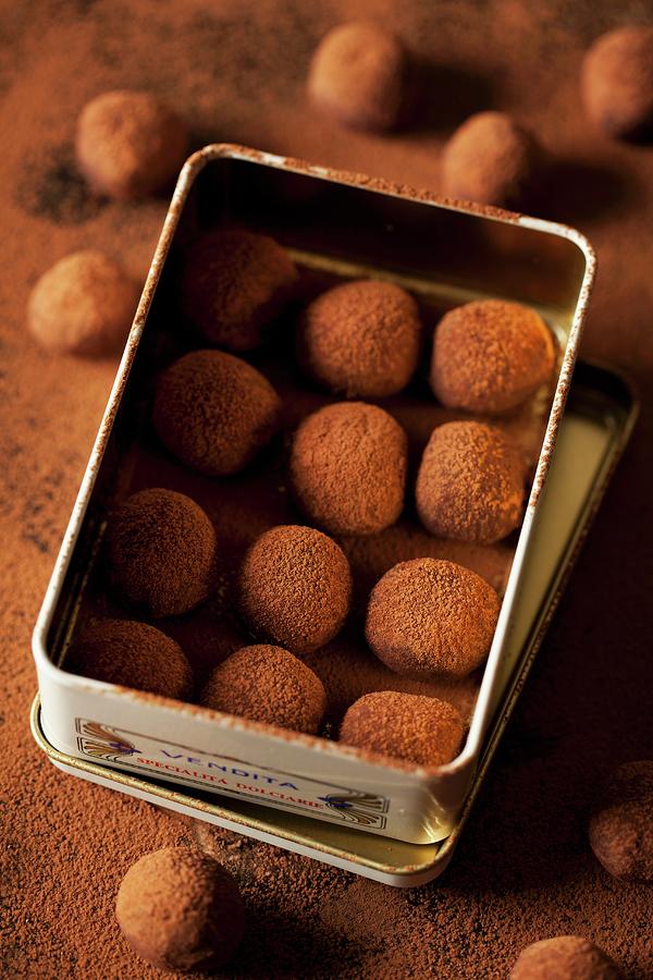 Chocolate Truffles In A Metal Tin Photograph by Jane Saunders