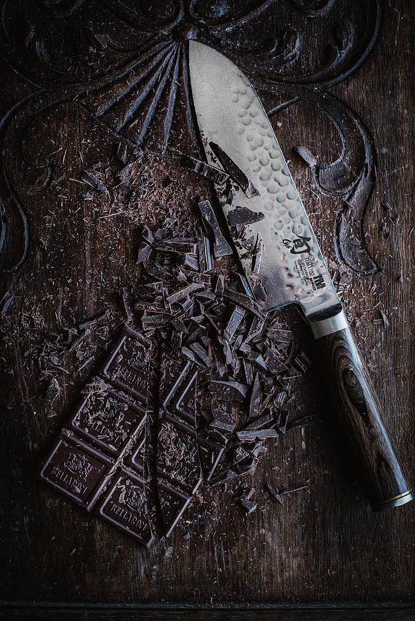 Chopped Chocolate With A Knife On A Wooden Surface seen From Above Photograph by Justina Ramanauskiene