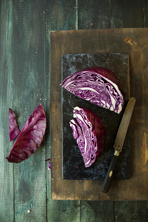 Chopped Red Cabbage On A Chopping Board Photograph by Patricia Miceli