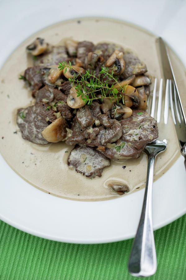 Chopped Venison In A Creamy Sauce With Mushrooms Photograph by Food Experts Group
