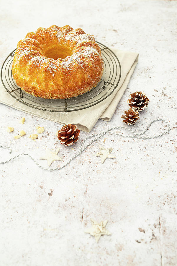 Christmas Almond Guglhupf With Powdered Sugar Photograph by Jan Wischnewski