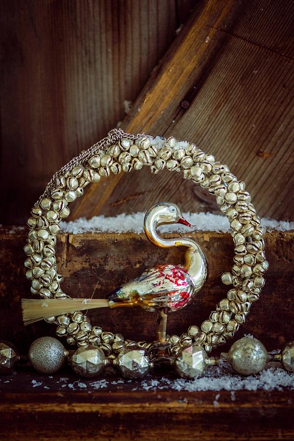 Christmas Arrangement Of Silver Wreath And Swan Photograph by Eising Studio