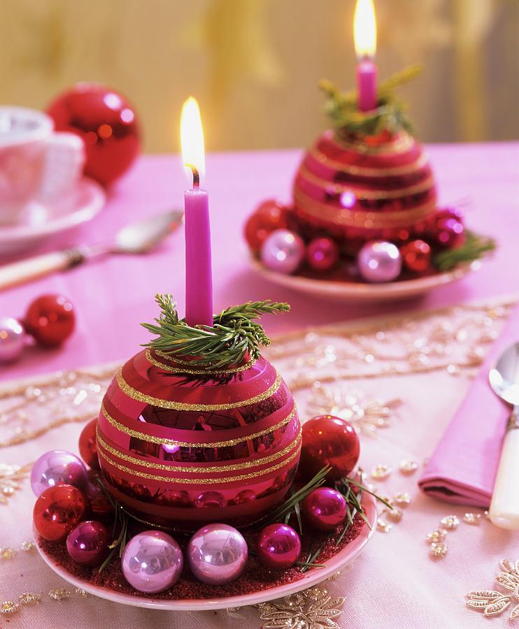 Christmas Baubles Used As Candle Holders Photograph by Friedrich Strauss