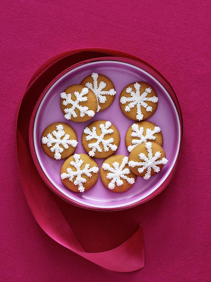 Christmas Biscuits Decorated With Snowflakes Photograph by Antonis Achilleos