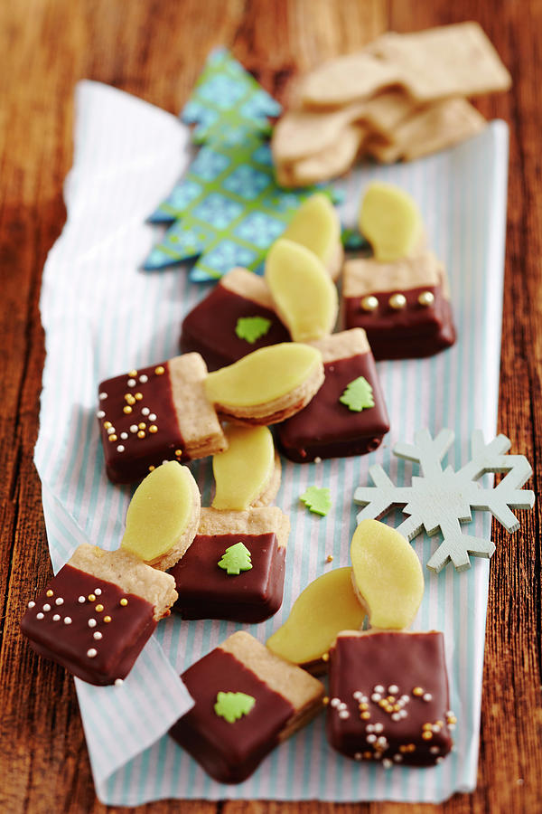 Christmas Candle Cookies With Nut Nougat And Marzipan Photograph by Teubner Foodfoto